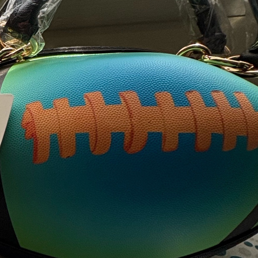 NWT-Rugby Teal & Lime
Whimsical Festival pebble textured football handbag - Picture 9 of 10